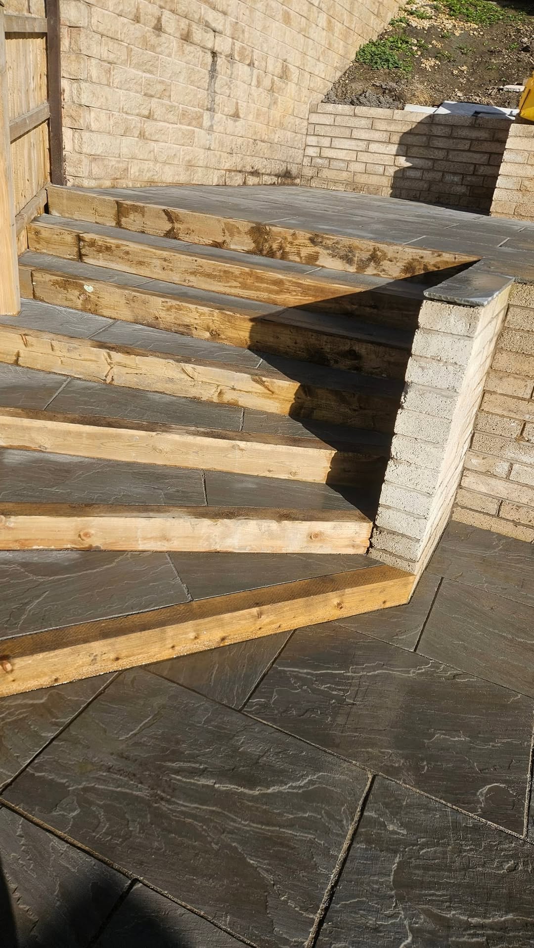 Stone garden steps and retaining wall